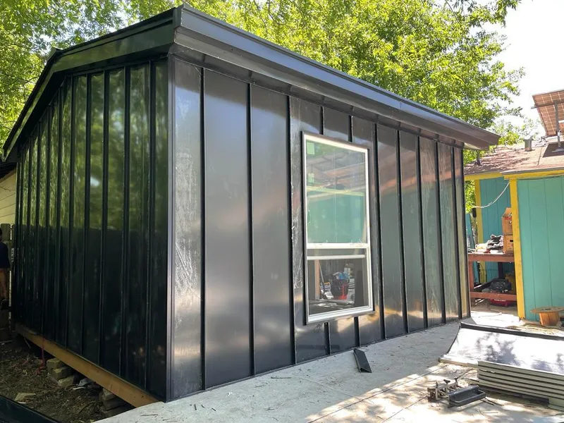 Black standing seam metal wall panels for Metal Roof Installation in East Highland Park